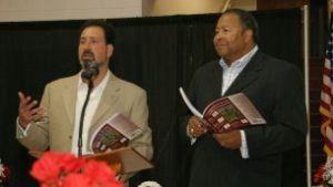 Rabbi Spike Anderson and the Rev. William Flippin lead the seder at Greater Piney Branch Baptist Church. 